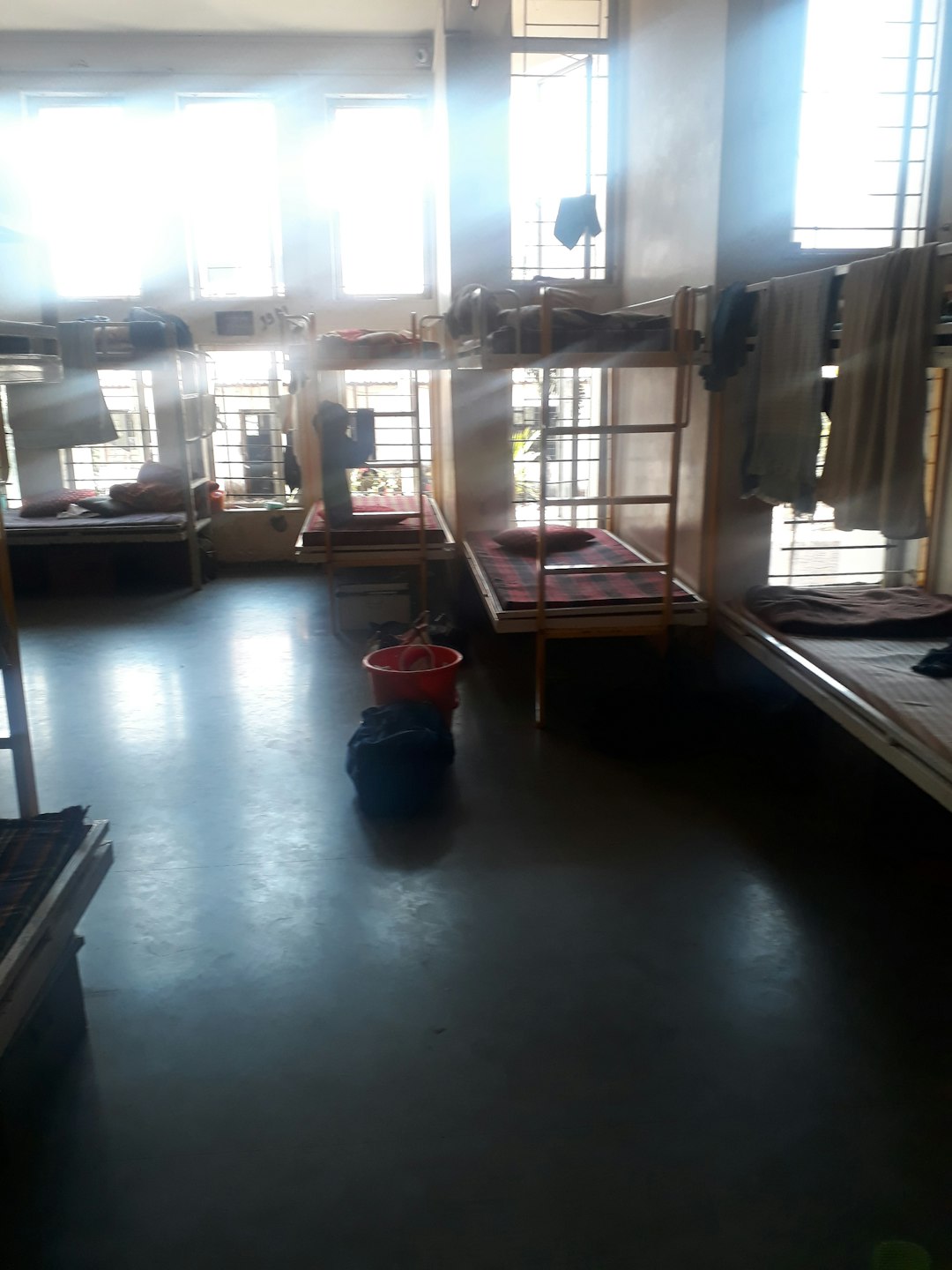 Budget hostel dormitory room with bunk beds