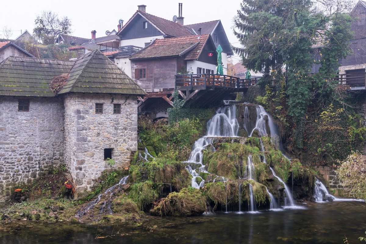 Rastoke village with waterfalls flowing through traditional area